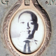 A photo of Emmett Till is included on the plaque that marks his gravesite at Burr Oak Cemetery, May 4, 2005, in Aslip, Ill.
Scott Olson/Getty Images